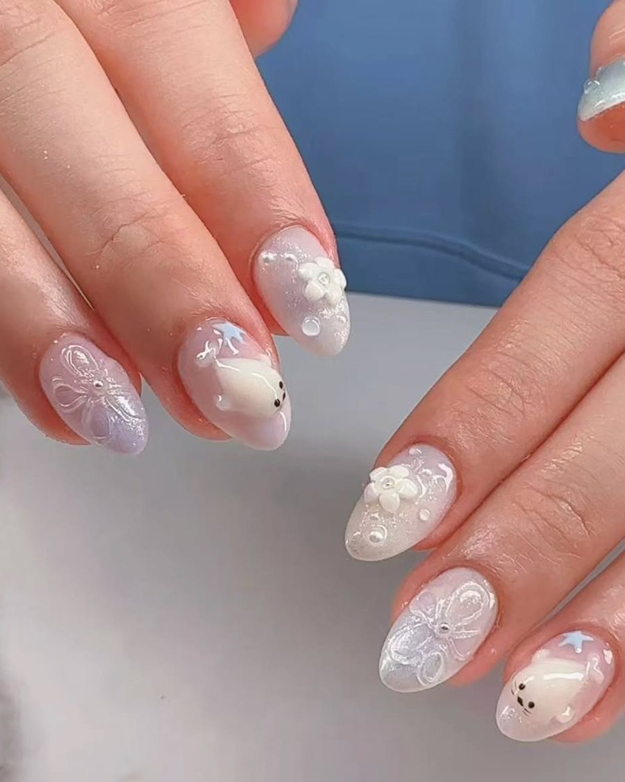 Sheer nails with raised white floral art